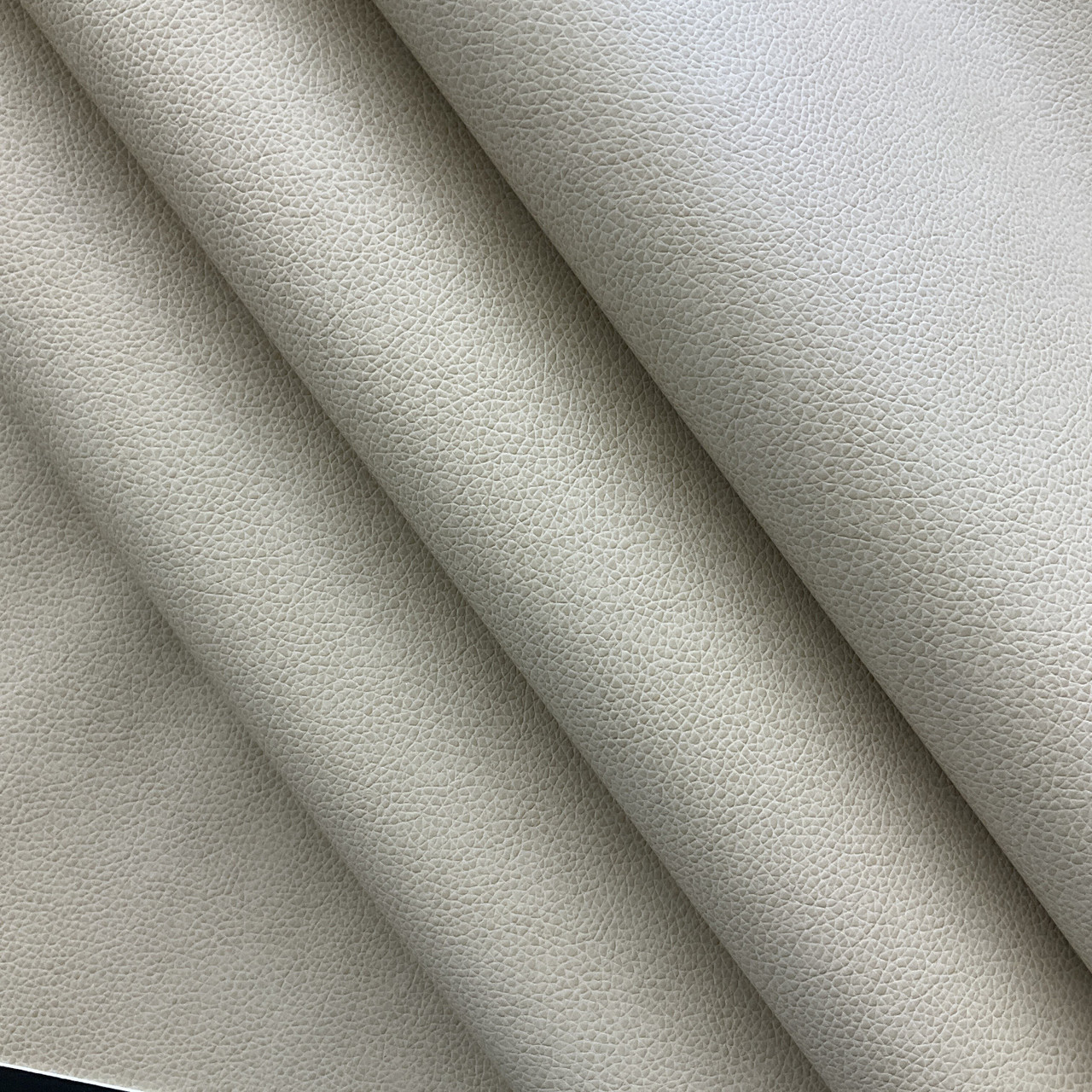 An application scenario or product detail of leather upholstery fabric by the yard - Image 13