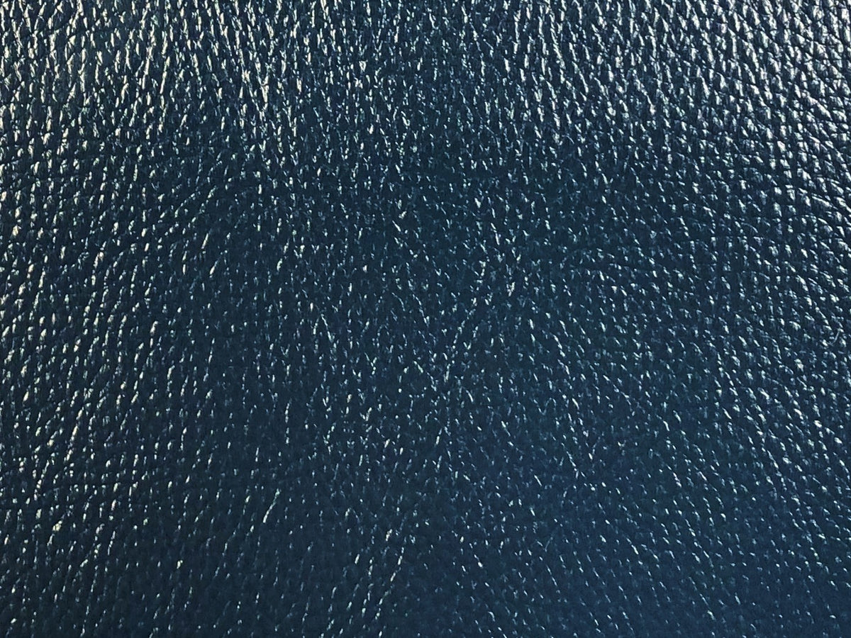An application scenario or product detail of navy blue faux leather fabric - Image 17