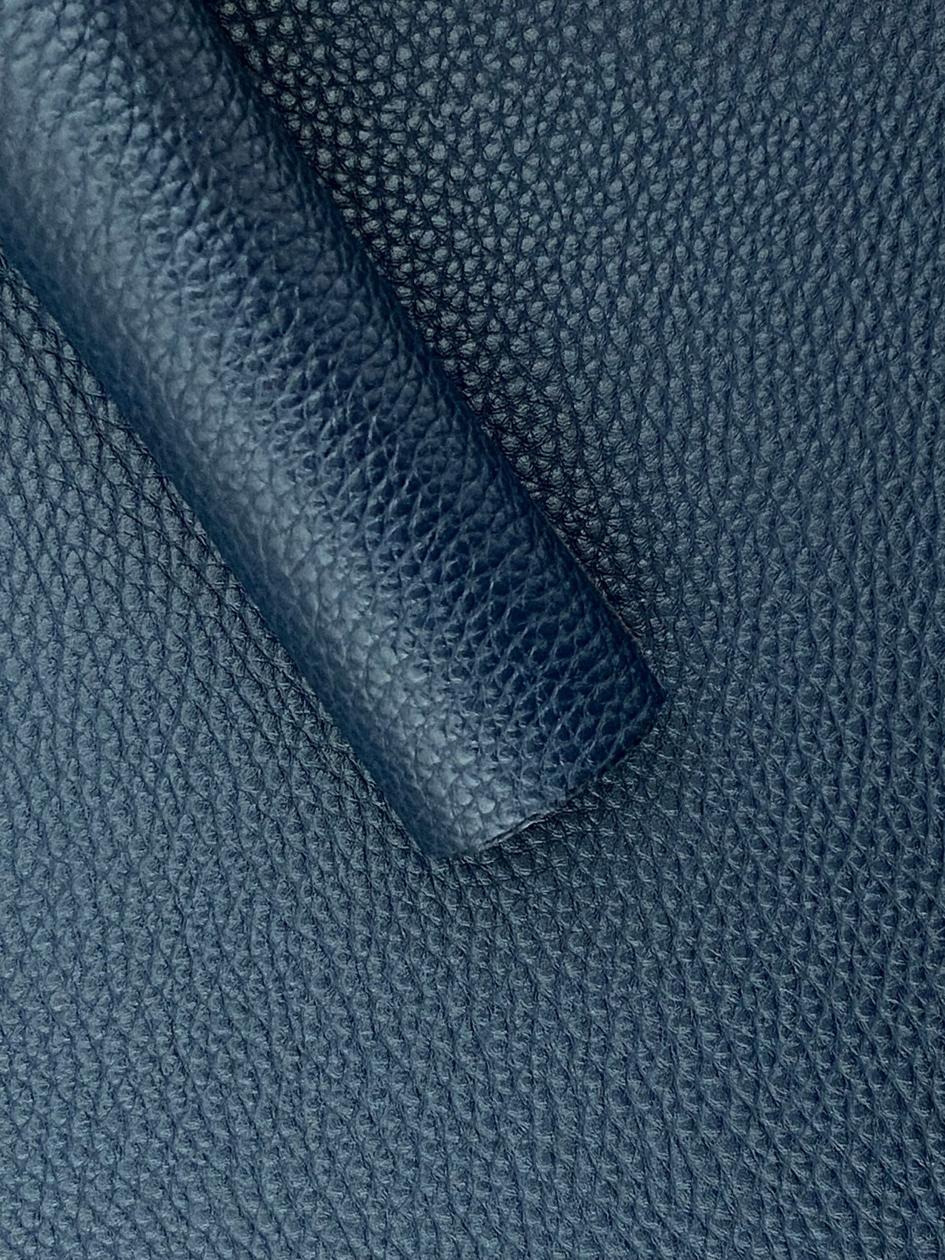 An application scenario or product detail of navy blue faux leather fabric - Image 18