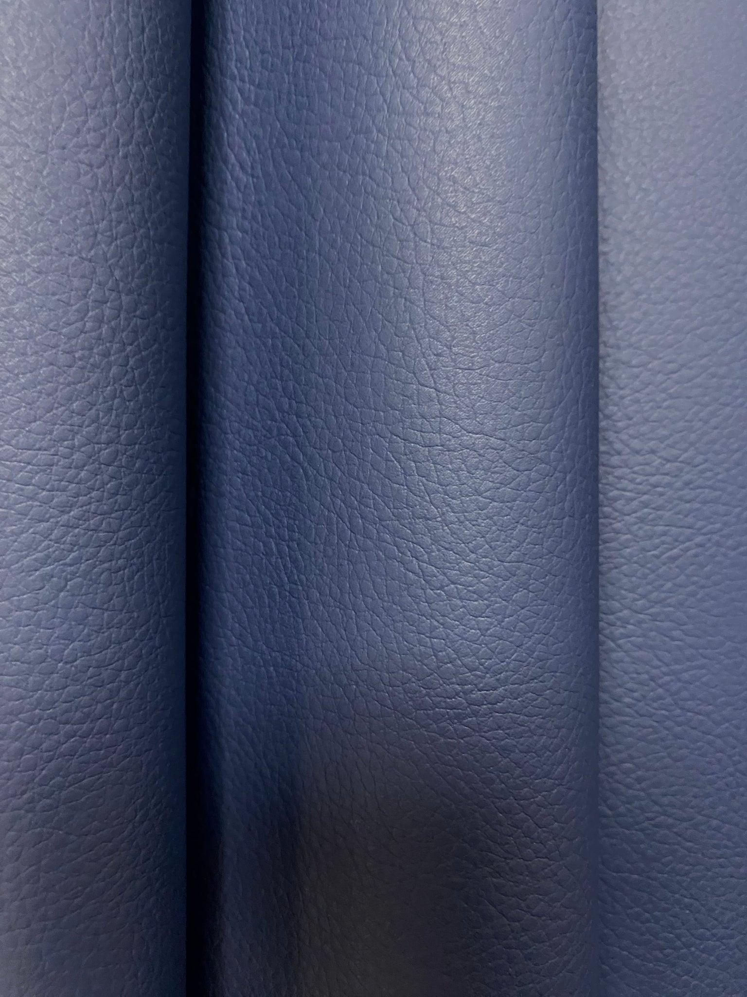An application scenario or product detail of navy blue faux leather fabric - Image 20