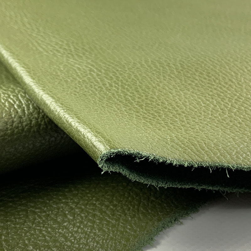An application scenario or product detail of olive green leather fabric - Image 11