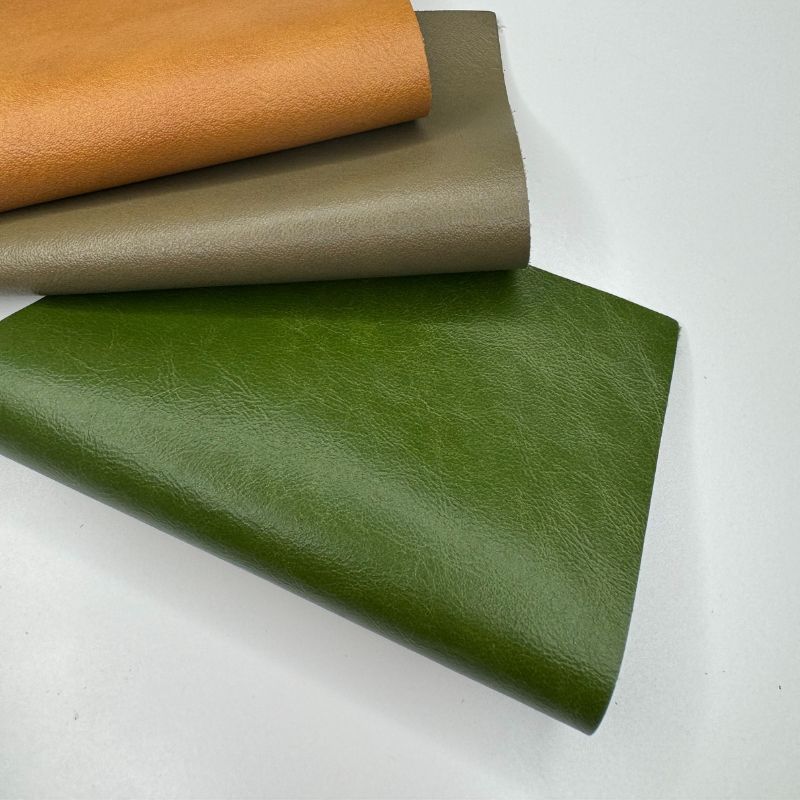 An application scenario or product detail of olive green leather fabric - Image 16