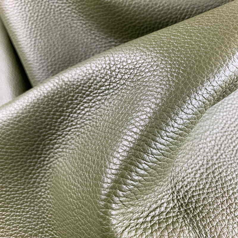 An application scenario or product detail of olive green leather fabric - Image 19