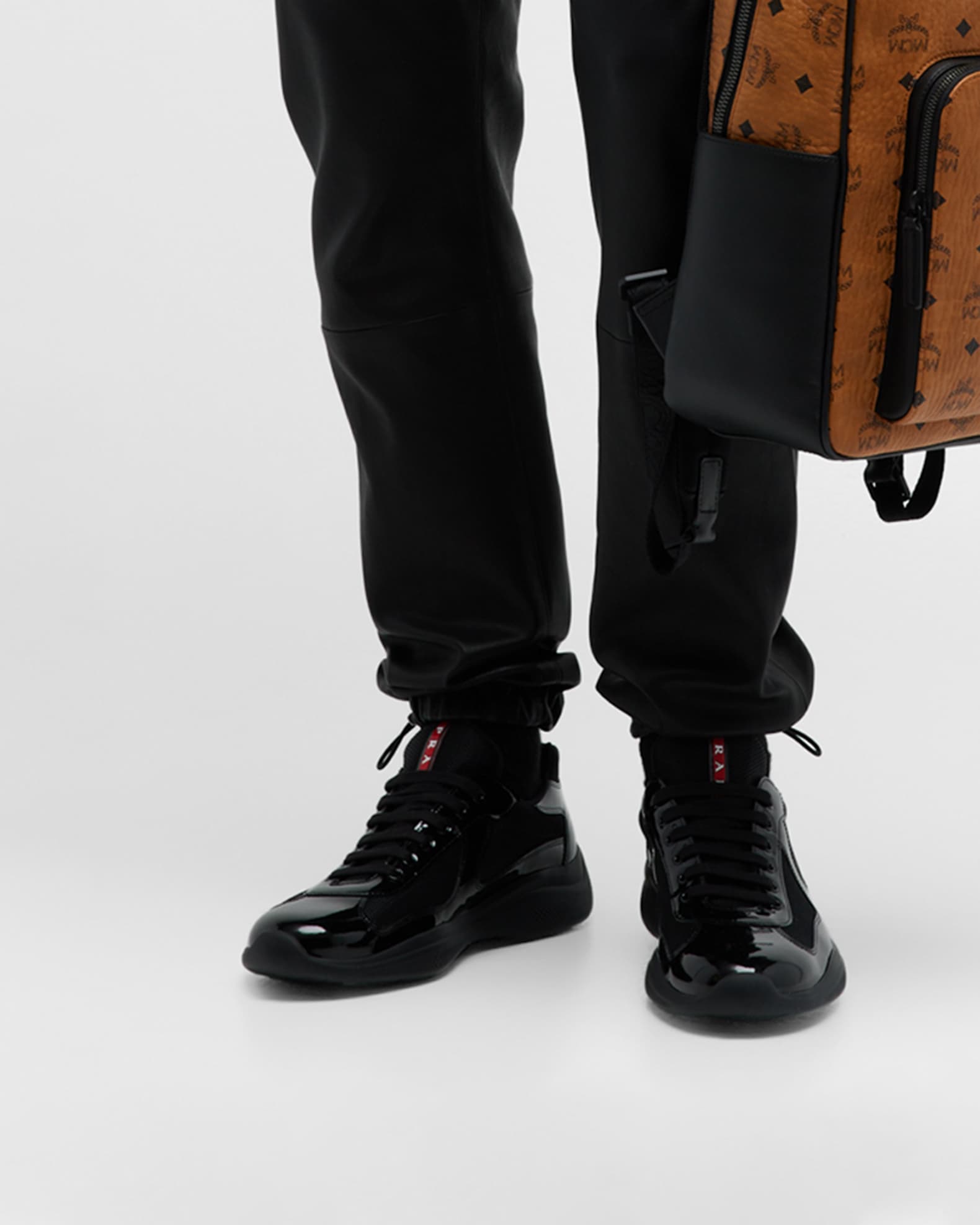 An application scenario or product detail of patent leather and technical fabric prada america's cup sneakers - Image 9