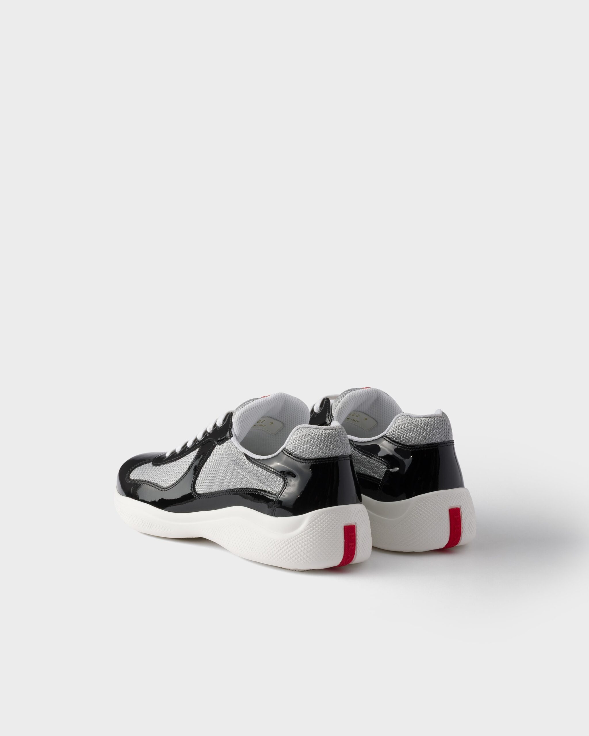 An application scenario or product detail of patent leather and technical fabric prada america's cup sneakers - Image 17