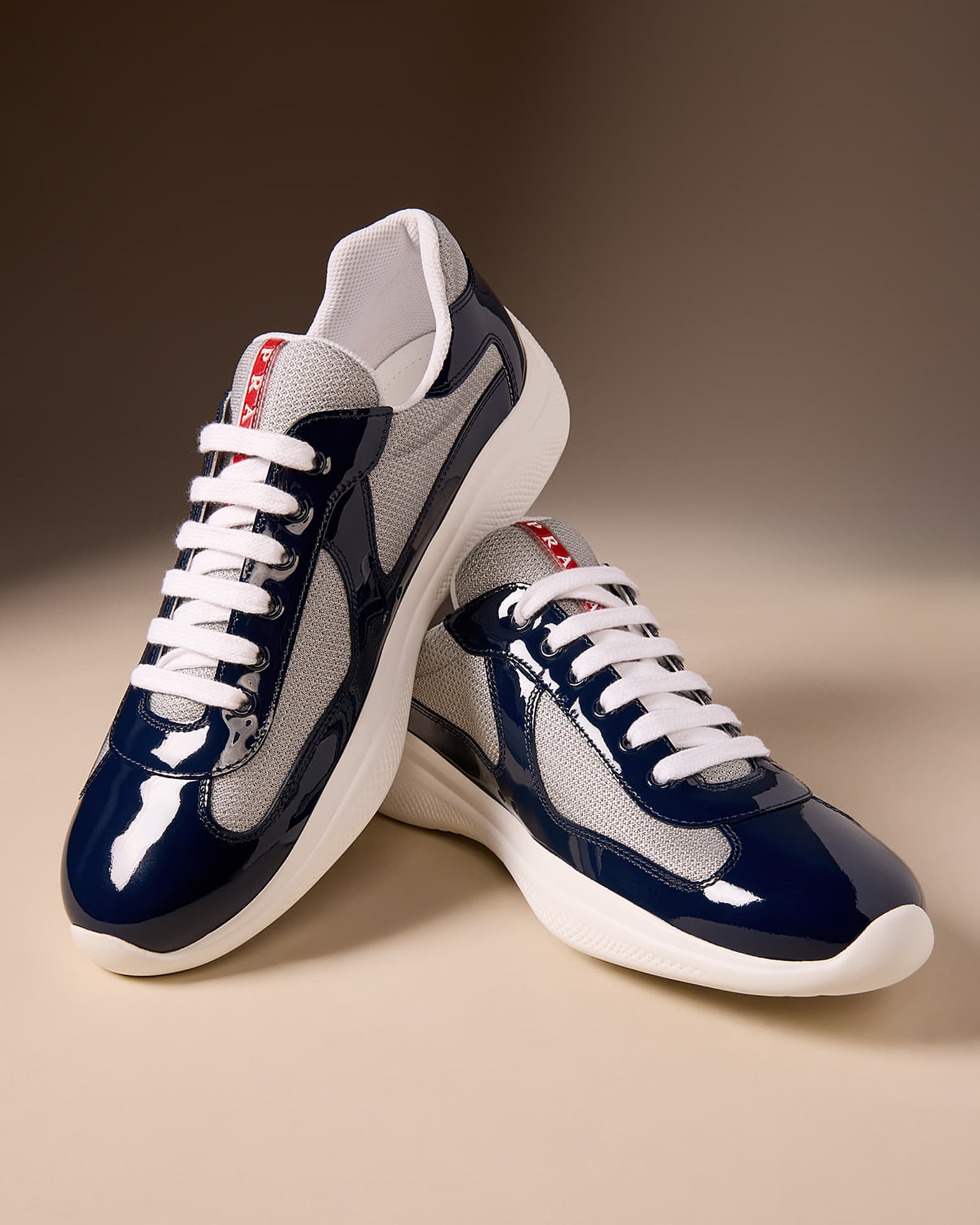Featured image for the patent leather and technical fabric prada america's cup sneakers guide