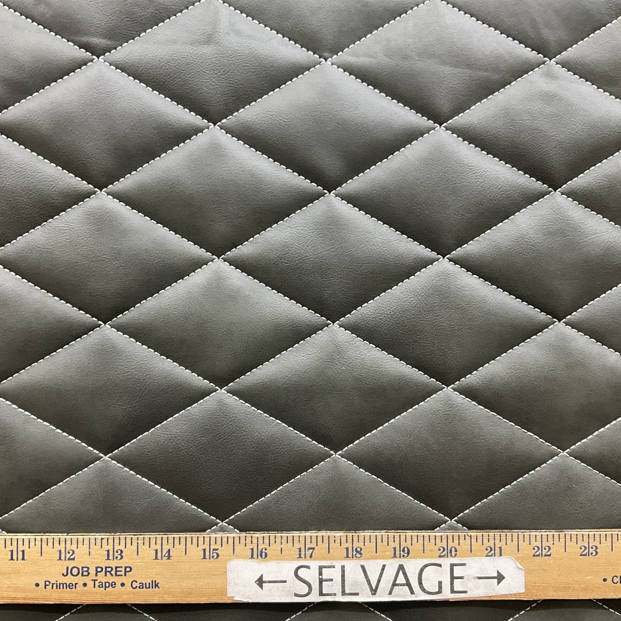 An application scenario or product detail of quilted leather fabric - Image 5
