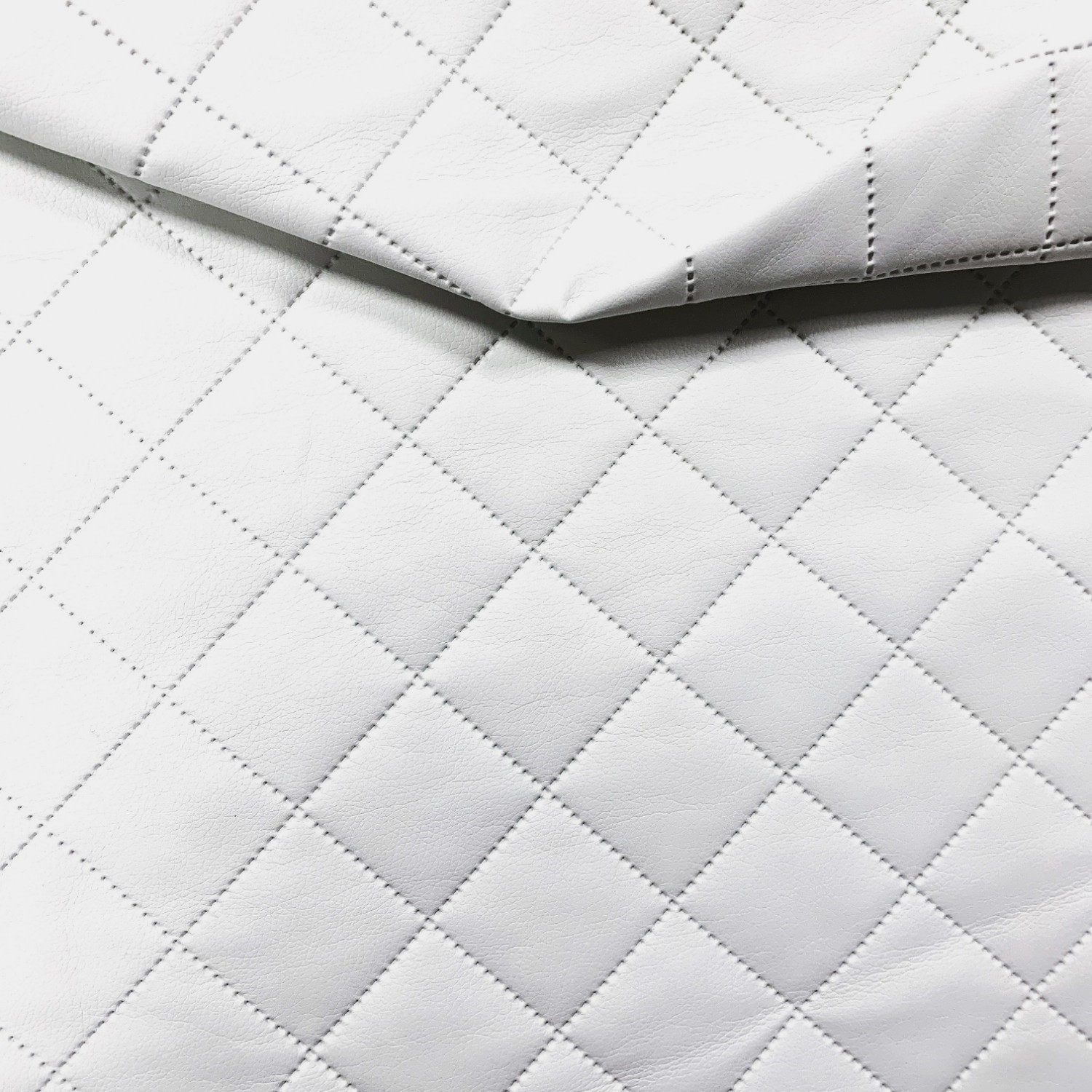 An application scenario or product detail of quilted leather fabric - Image 15