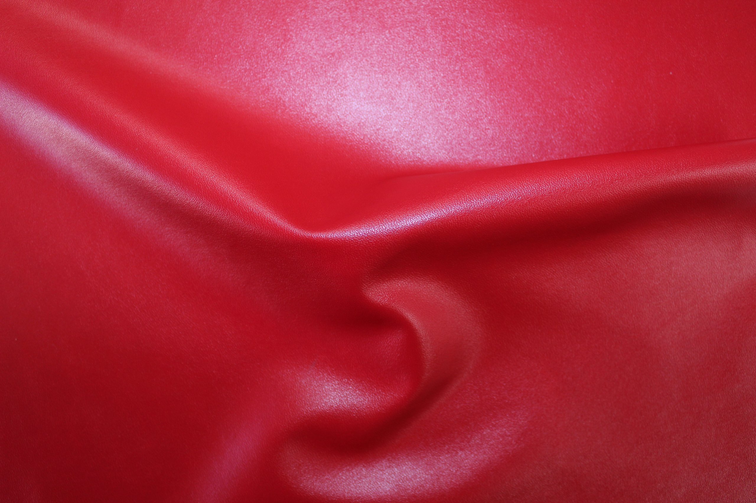 An application scenario or product detail of red faux leather fabric - Image 10