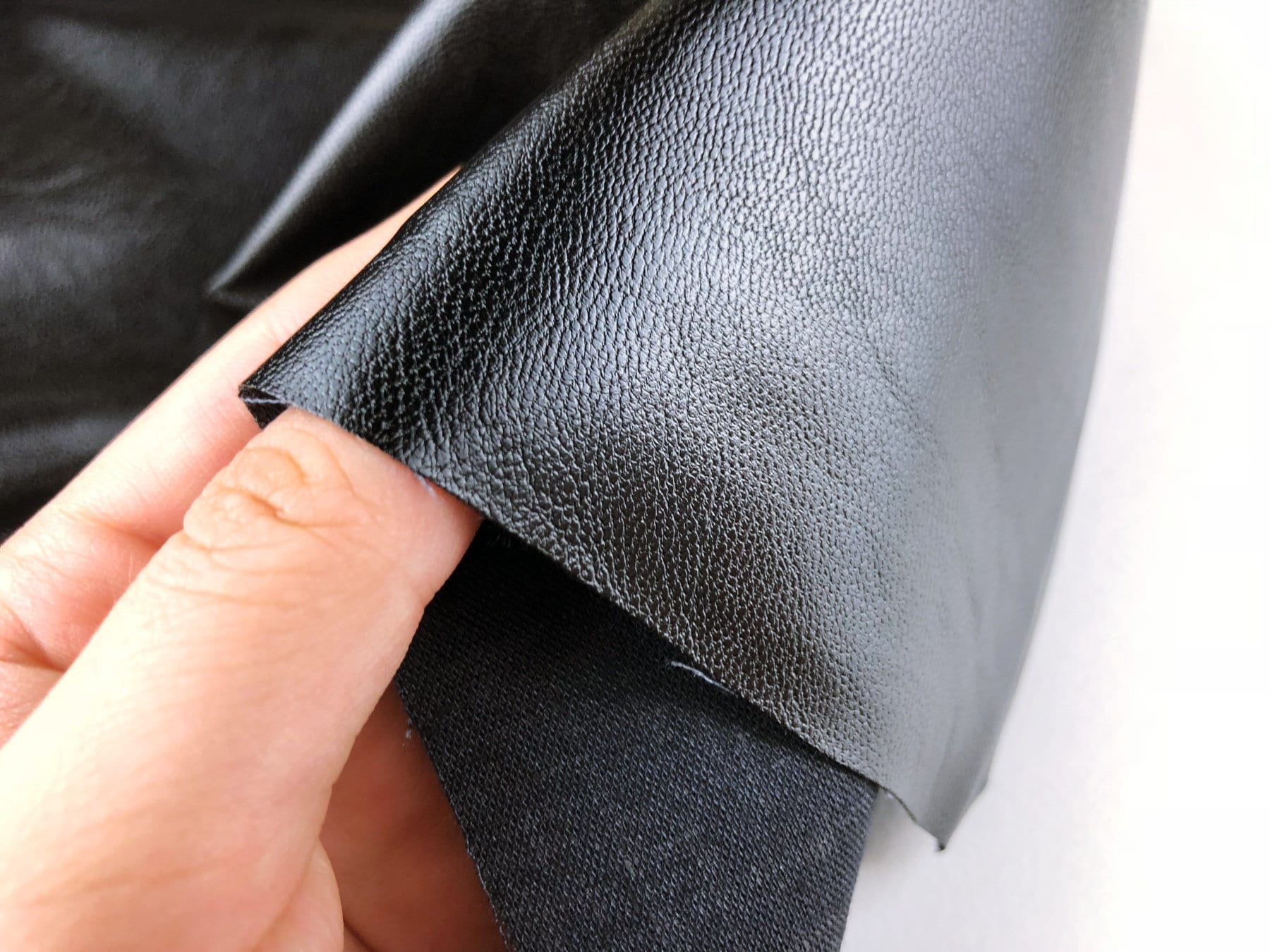 An application scenario or product detail of simulated leather fabric - Image 1