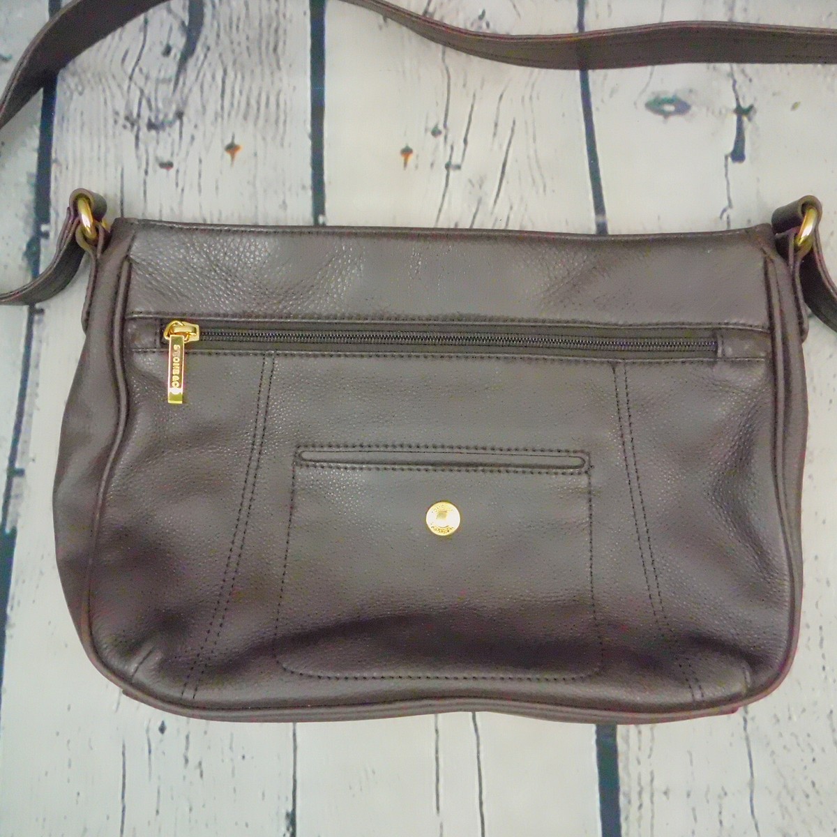 An application scenario or product detail of stone and company leather purses - Image 1