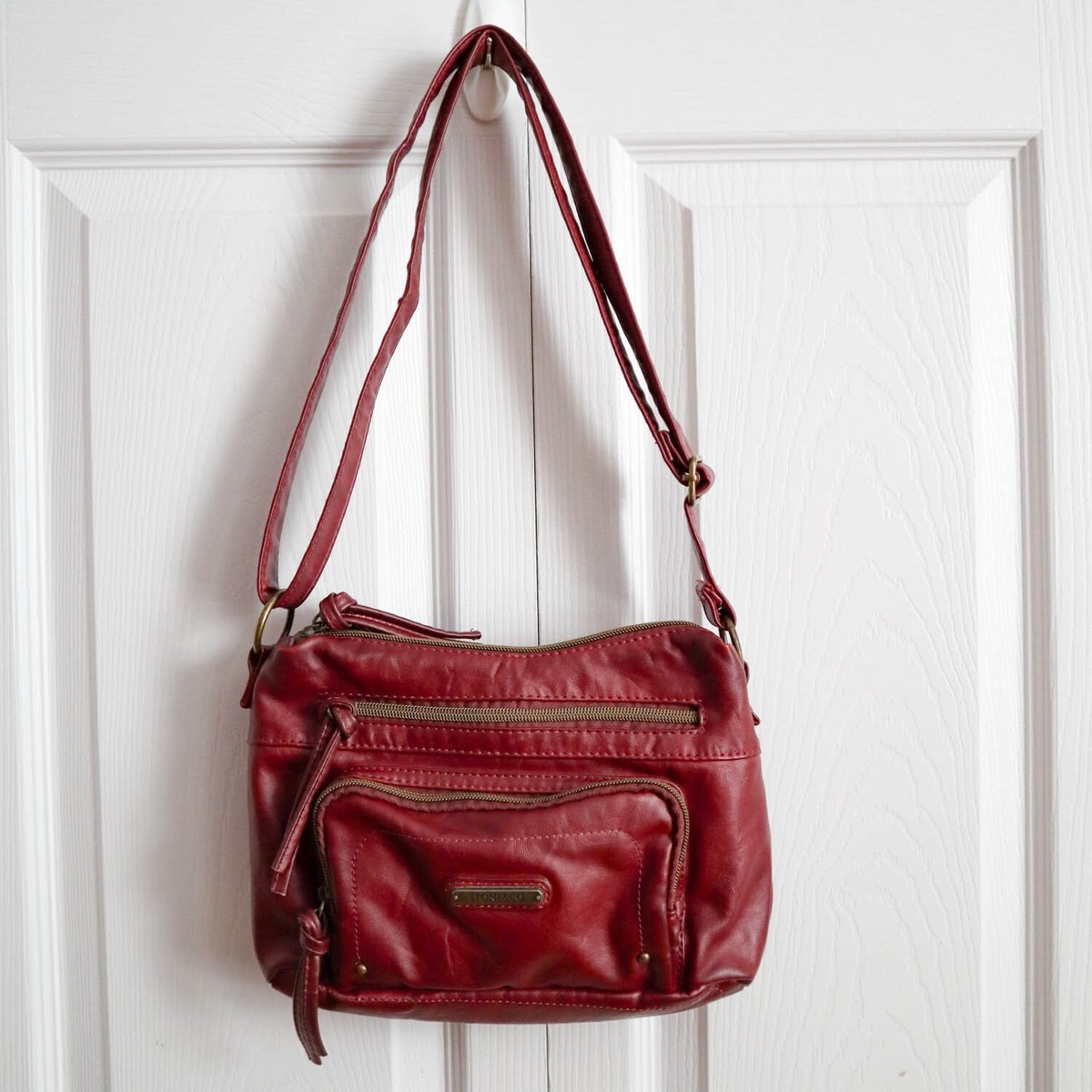 An application scenario or product detail of stone and company leather purses - Image 9