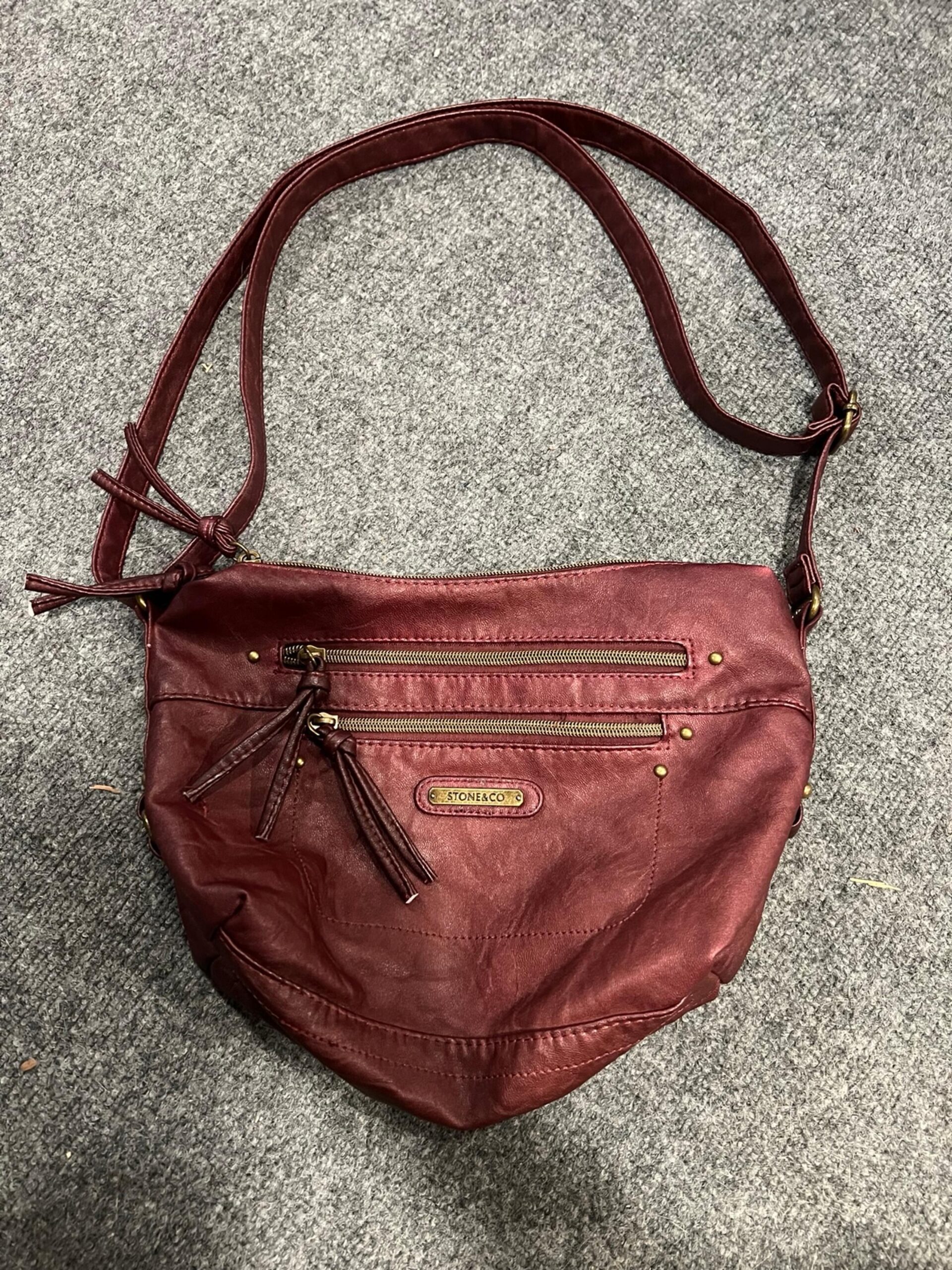 An application scenario or product detail of stone and company leather purses - Image 20