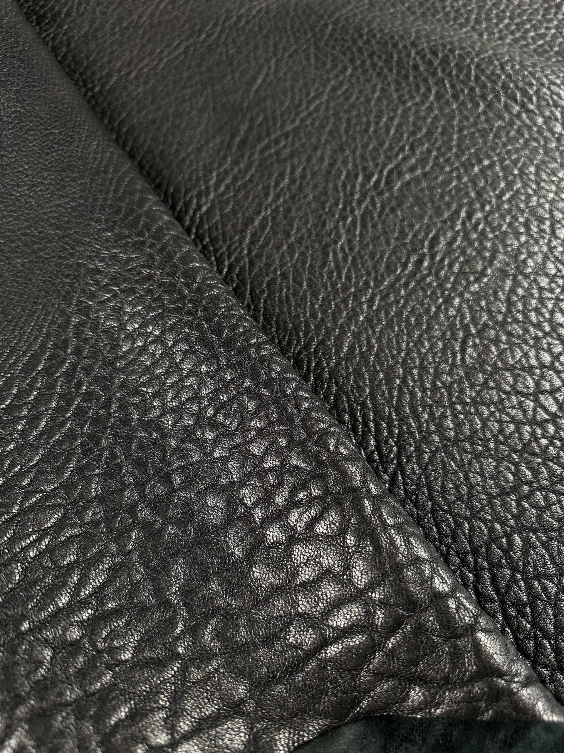 An application scenario or product detail of textured leather fabric - Image 11