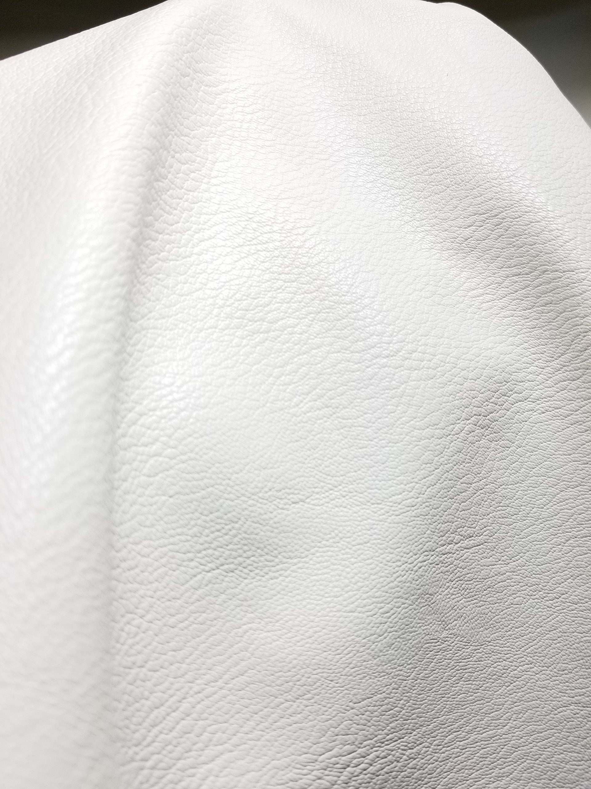 An application scenario or product detail of white fake leather fabric - Image 2