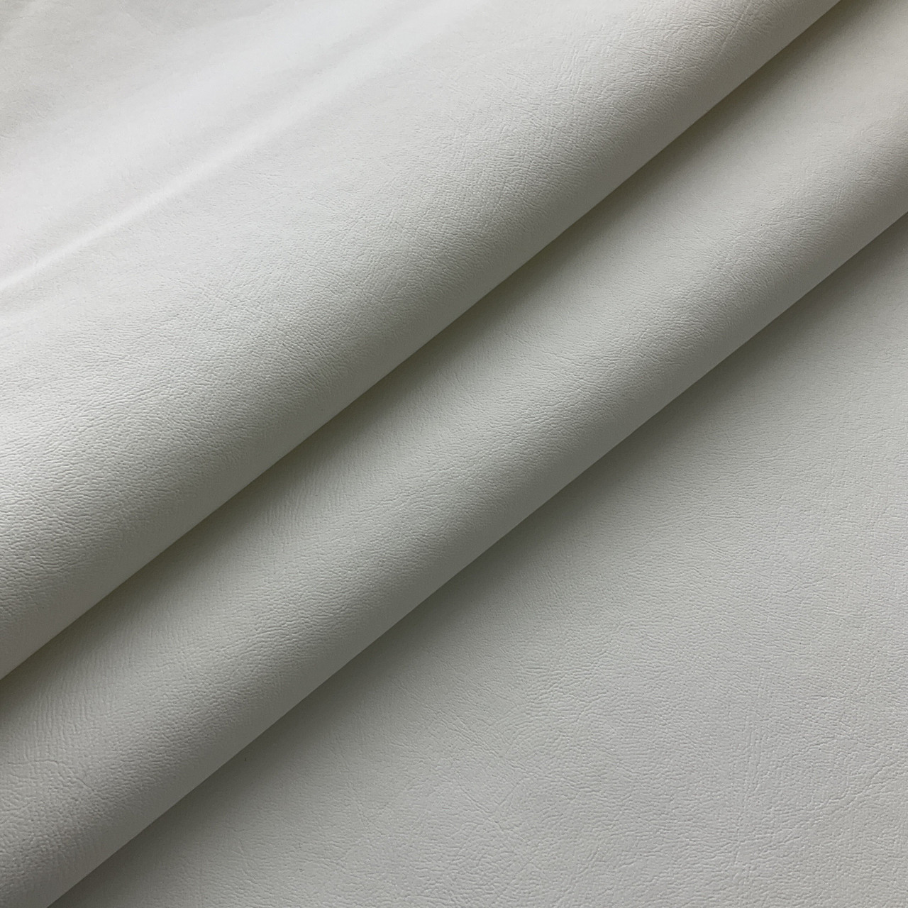 An application scenario or product detail of white fake leather fabric - Image 6