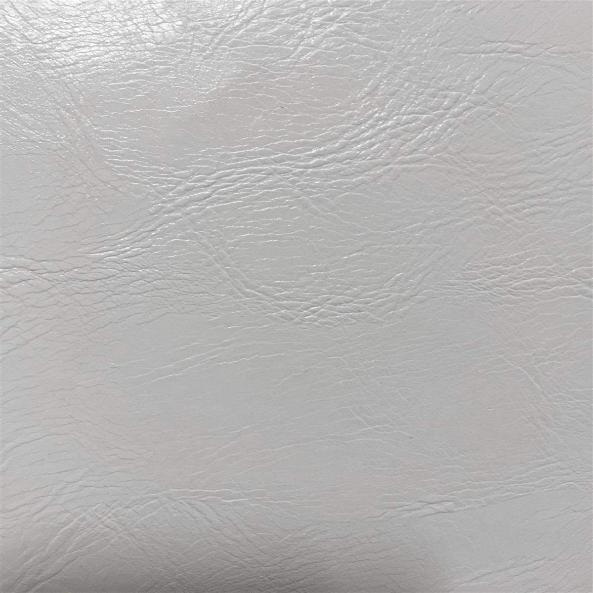 An application scenario or product detail of white fake leather fabric - Image 8