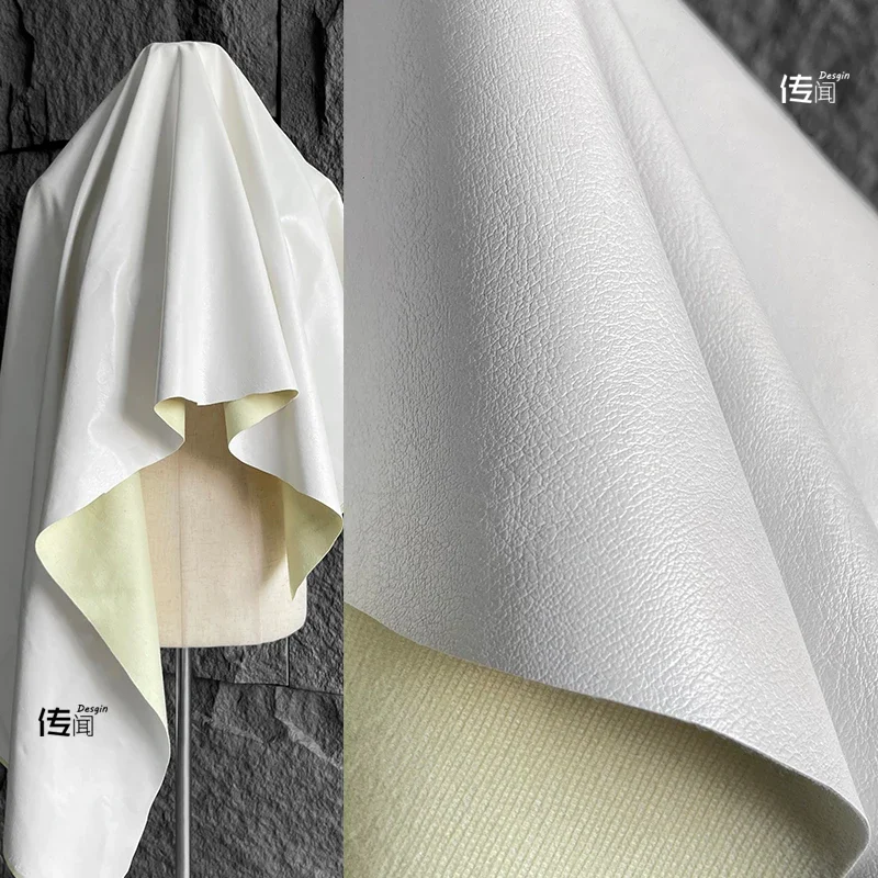 An application scenario or product detail of white fake leather fabric - Image 22