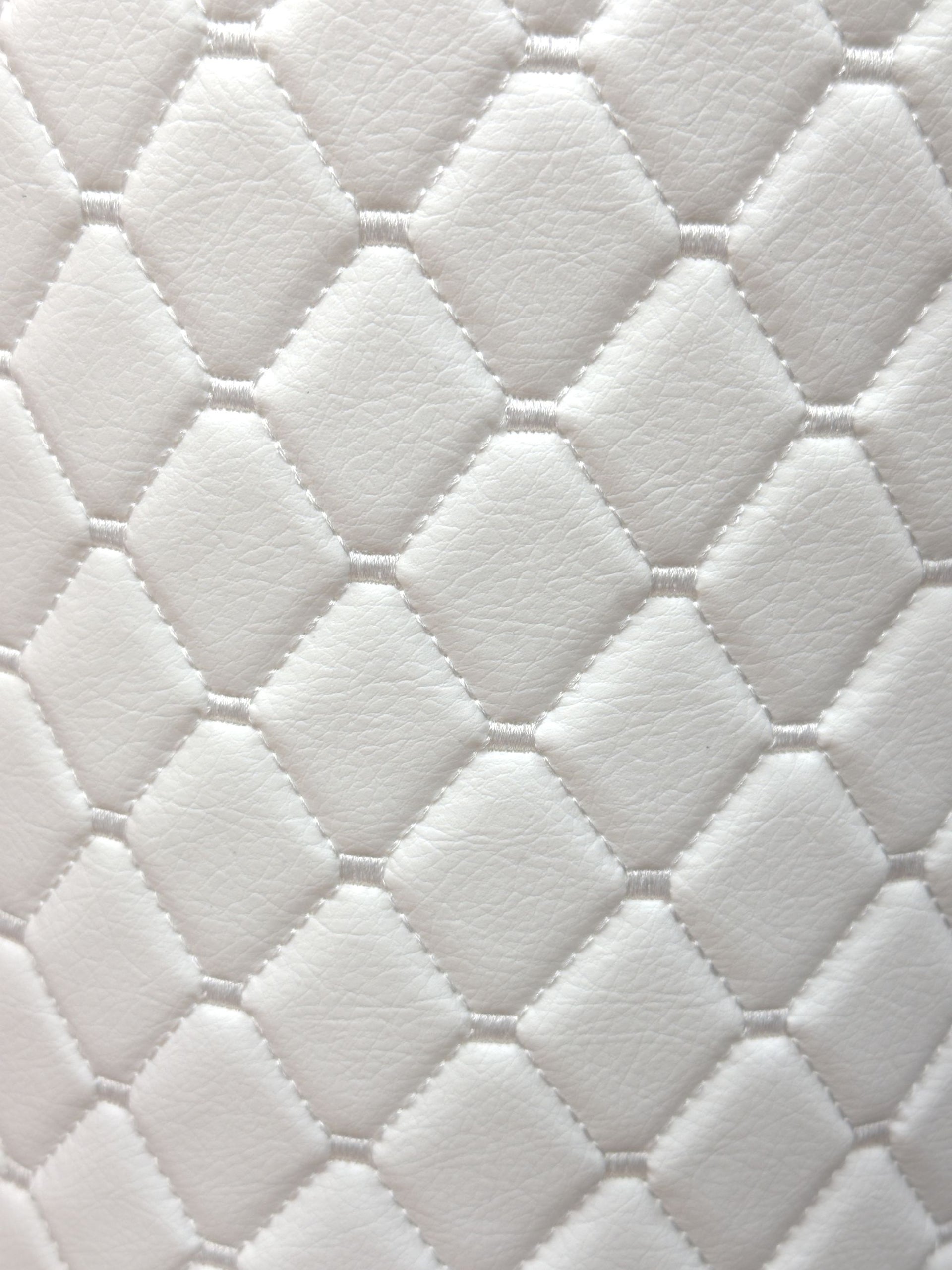 An application scenario or product detail of white leather fabric - Image 3